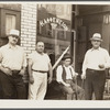 Workers at American Bridge Company in front of Greek coffee shop. Ambridge, Pennsylvania