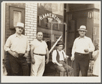 Workers at American Bridge Company in front of Greek coffee shop. Ambridge, Pennsylvania