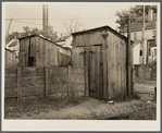 Toilets behind mill worker's houses. Millville, New Jersey