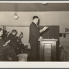 Preacher conducting hymn singing. Pentecostal church, Cambria, Illinois
