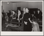 Praying during revival meeting. Pentecostal church, Cambria, Illinois