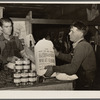 Unemployed miner with food from surplus commodities corporation. Zeigler, Illinois