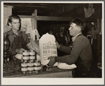 Unemployed miner with food from surplus commodities corporation. Zeigler, Illinois