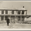 William Wallace, resettled farmer in front of his new home. Oswego County, New York