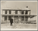 William Wallace, resettled farmer in front of his new home. Oswego County, New York