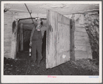 Safety inspector. This man uses a special lamp to test for gas throughout the mine. Old Ben number eight, West Frankfort, Illinois