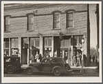 Unemployed miners on street corner. Johnston City, Illinois