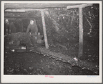 Mechanical cutting machine that increases coal production. Old Ben number eight mine. West Frankfort, Illinois