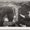 Shoring up the roof of the mine. Old Ben number eight. West Frankfort, Illinois