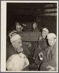 Underground at Old Ben number eight mine. These men are on a "man-trip" which goes three and half miles to the face of the coal