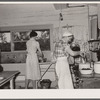 Cook and hired girl in kitchen. Quarter Circle 'U' Ranch, Montana