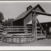 Corral gate and watering trough. Quarter Circle 'U' Ranch, Montana