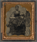 Portrait of Black Woman With Two White Children