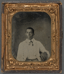 Portrait of Young Man in Coat and Western-Style Tie
