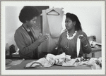 Two women in Patrick Kelly's Paris atelier, including a seamstress
