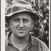 Hired hand on dairy farm. Dakota County, Minnesota