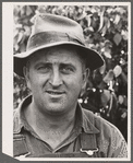 Hired hand on dairy farm. Dakota County, Minnesota