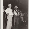 Farmers at livestock auction. Central Iowa Fair, Marshalltown, Iowa