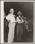 Farmers at livestock auction. Central Iowa Fair, Marshalltown, Iowa