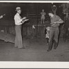 County agent checks off a winner of the calf-scramble. Central Iowa Fair, Marshalltown, Iowa