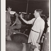 Auctioneer at hog sale. Central Iowa Fair, Marshalltown, Iowa
