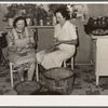 Wife of resettlement borrower, San Luis Valley Farms, Colorado, and daughter preparing beans for canning
