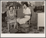Wife of resettlement borrower, San Luis Valley Farms, Colorado, and daughter preparing beans for canning