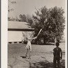 Pupils of one room school house playing ball during recess. Grundy County, Iowa