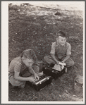 Children (pupils of one-room schoolhouse) eating lunch. Grundy County, Iowa