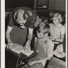 Lois Slinker and one of her pupils in one-room schoolhouse. Grundy County, Iowa