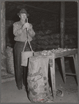 USDA (United States Department of Agriculture) inspector grades potatoes. Monte Vista, Colorado