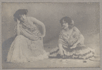 Two women, one smoking