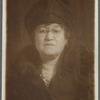 Portrait photograph of Carolyn Victoria Morgan, with dark background