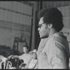 Gilbert Moses [center] and ensemble in rehearsal for the stage production Ain't Supposed to Die a Natural Death