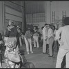 Gilbert Moses [right] and ensemble in rehearsal for the stage production Ain't Supposed to Die a Natural Death