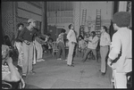 Gilbert Moses [right] and ensemble in rehearsal for the stage production Ain't Supposed to Die a Natural Death