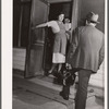 Wife of a rehabilitation client greets a physician who cooperates with the FSA (Farm Security Administration) medical health program. Saint Charles County, Missouri