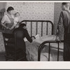 A physician cooperating with FSA (Farm Security Administration) medical health plan visits the home of a rehabilitation client. Saint Charles County, Missouri