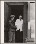 Rehabilitation client after receiving treatment leaves office of dentist participating in FSA (Farm Security Administration) health program. Saint Charles County, Missouri