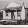 One of the eight houses built by the Farm Security Administration to provide adequate shelters for tiff miners