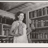 Mrs. Lawrence Corda, wife of tiff miner, with some of her 800 quarts of food canned under supervision of FSA (Farm Security Administration). Washington County, Missouri