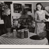Mrs. Dixon cans an adequate supply of fruits and vegetables to give her family a balanced diet during the winter. Saint Charles County, Missouri