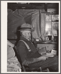 Grandfather of family living in paw-paw patch in the center of tiff miners. Washington County, Missouri