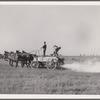 Spreading lime. Greene County, Missouri