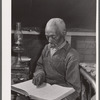 Evicted sharecropper reading the Bible. Butler County, Missouri