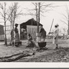Washing clothes at camp for evicted sharecroppers. Butler County, Missouri