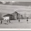 Grade school pupils in playground of experimental school for education of students. University of Wyoming at Laramie.
