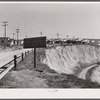 Workers' homes on edge of copper pit. Ruth, Nevada