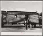 Loading mail into railroad car. Carson City, Nevada