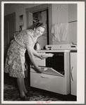 Vernon County, Wisconsin. Mrs. Saugstad about to bake a pie in her electric oven